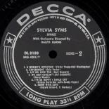 Syms_Sings_Label_2.jpg
