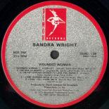 Sandra_Wright_Wounded_Woman_Label_A.jpg